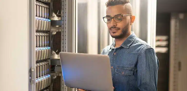 Man with open laptop in his hands