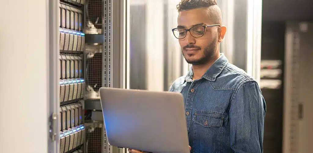Man with open laptop in his hands