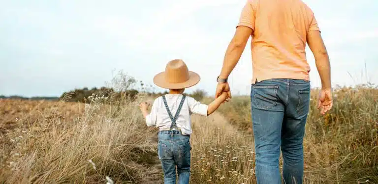 Dad with son in the field